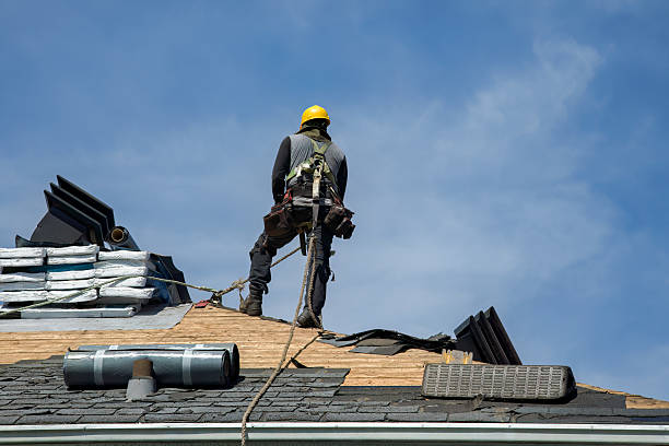 Professional Gutter Installation technician working in Reynolds, ND